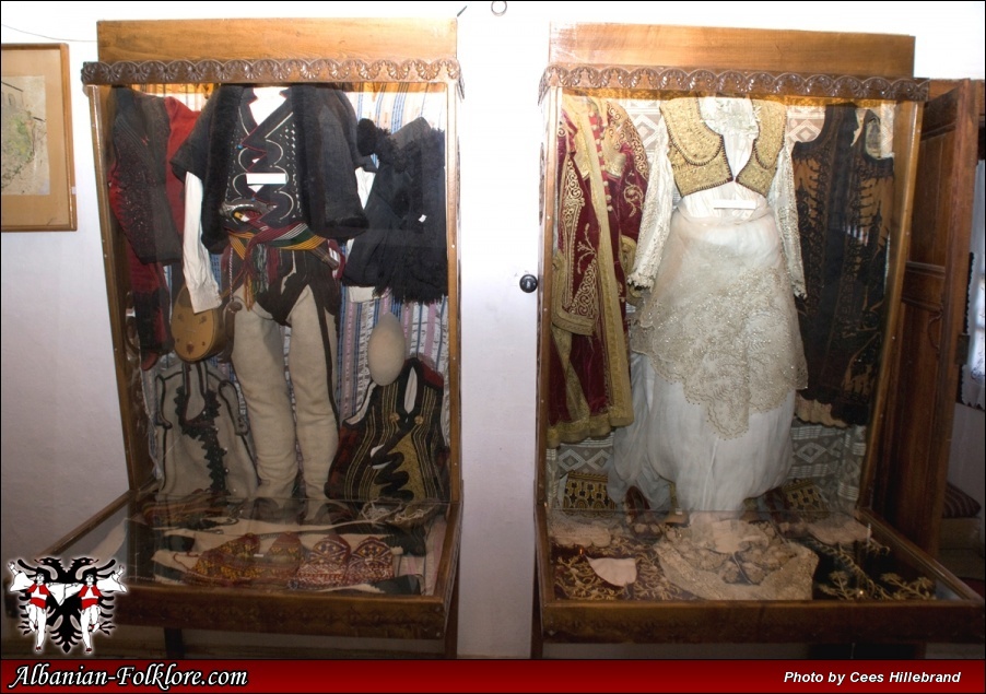 Man's and woman's dress on display